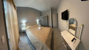 Телевизор и/или развлекательный центр в Argo Summer Apartment