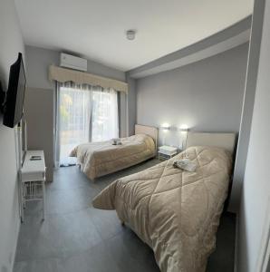 Кровать или кровати в номере Argo Summer Apartment