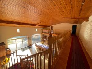 an overhead view of a room with a wooden ceiling at Domaine de la Chambre in Verrières +56 photos