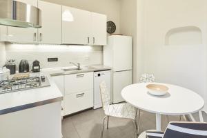 Η κουζίνα ή μικρή κουζίνα στο Easylife - Milano - Battisti 13 - Duomo +38 φωτογραφίες