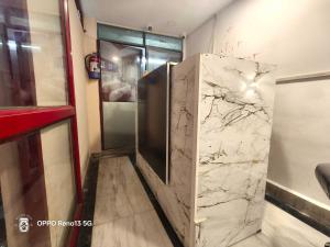 TV/trung tâm giải trí tại Hotel O THE VINOD VILLAGIO +1 ảnh