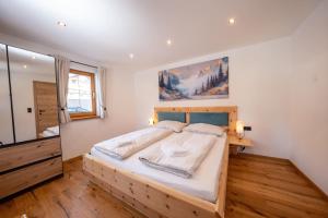 Ένα ή περισσότερα κρεβάτια σε δωμάτιο στο Apartments Kressl