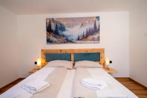 Ένα ή περισσότερα κρεβάτια σε δωμάτιο στο Apartments Kressl +46 φωτογραφίες