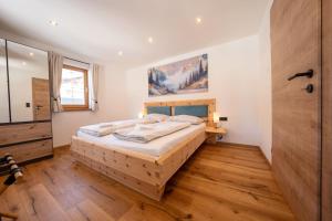 Ένα ή περισσότερα κρεβάτια σε δωμάτιο στο Apartments Kressl