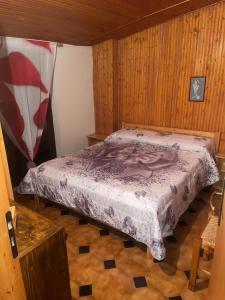 a bedroom with a bed in a room at Villa Anna Palumbo Sila in Torre Caprara