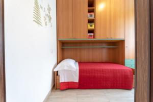 Postel nebo postele na pokoji v ubytování Viola - lido adriano + 11 fotografií