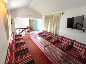 TV a/nebo společenská místnost v ubytování Meadows Mountain Villa + 37 fotografií