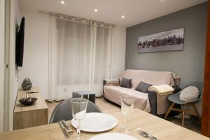 Khu vực ghế ngồi tại Apartamento a 5 min del funicular de Encamp , 3-3