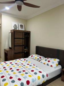 En eller flere senge i et værelse på M adora Kuala Lumpur Studio Room