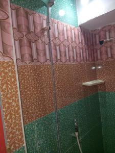 Koupelna v ubytování Triveni Home