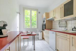 Køkken eller tekøkken på T3 rénové entre Versailles SQY