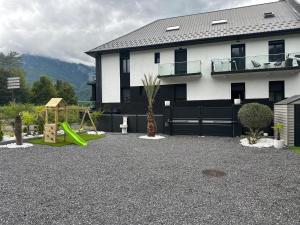 Un jardín fuera de Super Appartement T2 Luxe