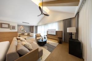 Posezení v ubytování Floral Hotel Changbaishan Baihe Left Bank