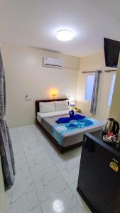 Giường trong phòng chung tại Kata Lina guesthouse