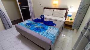 Giường trong phòng chung tại Kata Lina guesthouse