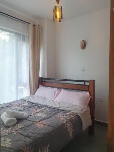 Ένα ή περισσότερα κρεβάτια σε δωμάτιο στο Tsavo Stanley kiambu Road +4 φωτογραφίες