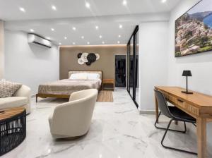 a bedroom with a bed and a desk at Hyde Park 6 Couples Retreat Apt With Jacuzzi in San Juan