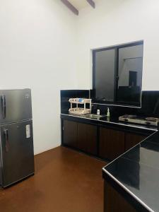 Η κουζίνα ή μικρή κουζίνα στο Agapeh Cottage