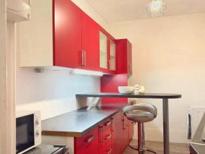 Køkken eller tekøkken på Aux portes de Paris + 2 billeder