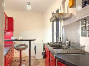 Køkken eller tekøkken på Aux portes de Paris