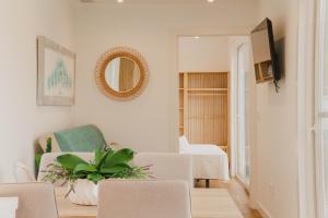 TV a/nebo společenská místnost v ubytování Bungalows Mar Menor, paz a orillas del mar