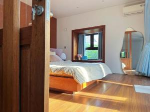 Ένα ή περισσότερα κρεβάτια σε δωμάτιο στο Le Home Phan Rang +10 φωτογραφίες