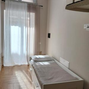 Postel nebo postele na pokoji v ubytování Divingreta 1820