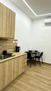 Η κουζίνα ή μικρή κουζίνα στο Fimicino House Stay