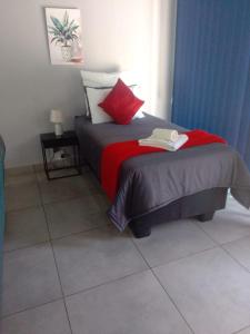 Ένα ή περισσότερα κρεβάτια σε δωμάτιο στο Columbae Guesthouse