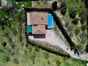 an overhead view of a house with a roof at Casa de mis sueños Castril in El Batán