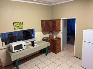 Η κουζίνα ή μικρή κουζίνα στο Nut Tree Nook