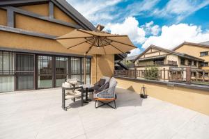 Balkón nebo terasa v ubytování Floral Hotel Changbaishan Baihe Left Bank