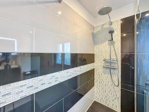 Koupelna v ubytování Dune Marchande - Séjour Cozy + 21 fotografií