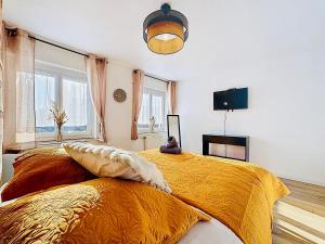 TV a/nebo společenská místnost v ubytování Dune Marchande - Séjour Cozy