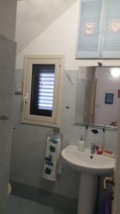 Koupelna v ubytování Appartamento Patty + 21 fotografií