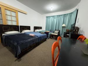 Postel nebo postele na pokoji v ubytování Private Room - Shared Bathroom, No Parking