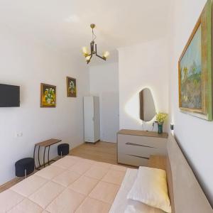 Postel nebo postele na pokoji v ubytování Mateo Rooms