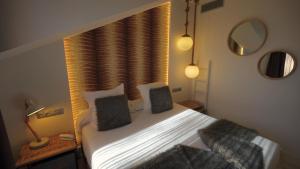 Postel nebo postele na pokoji v ubytování Hotel Cuevas - Adults Only