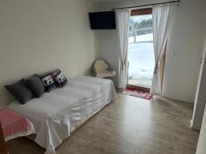 En eller flere senge i et værelse på Kleines aber feines Studio