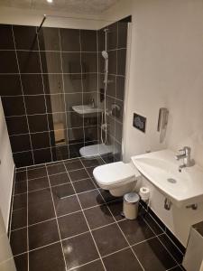 Koupelna v ubytování Cool Studio