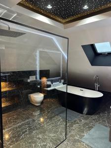 Ένα μπάνιο στο T4 TRES HAUT STANDING 130 mètres carré