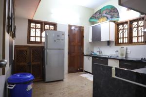 Η κουζίνα ή μικρή κουζίνα στο Gorgeous Inn +27 φωτογραφίες