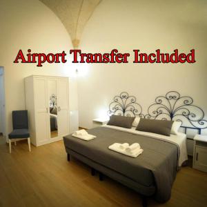 a bedroom with a large bed with two towels on it at B&b 20.09 in Brindisi