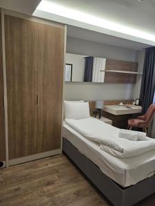 Ένα ή περισσότερα κρεβάτια σε δωμάτιο στο Frezya - Exclusively Woman