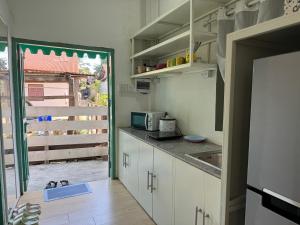 Η κουζίνα ή μικρή κουζίνα στο Casa de la Siesta - BNB set up