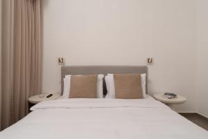 Postel nebo postele na pokoji v ubytování DreamyRent Aqua Sol Eilat + 6 fotografií