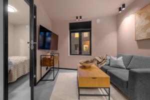 Телевизор и/или развлекательный центр в New apartment in the very heart of Tromsø