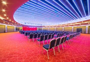a large room with chairs and a large ceiling at Bosphorus Sorgun Hotel - Ultra All Inclusive in Side +139 photos