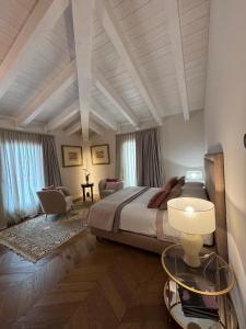 a bedroom with a large bed in a room at My Maison 49 in Empoli