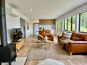 Χώρος καθιστικού στο Bay View Retreats- Ocean mist